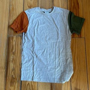 Urban Outfitters soft Tee with orange and green shirt sleeves.